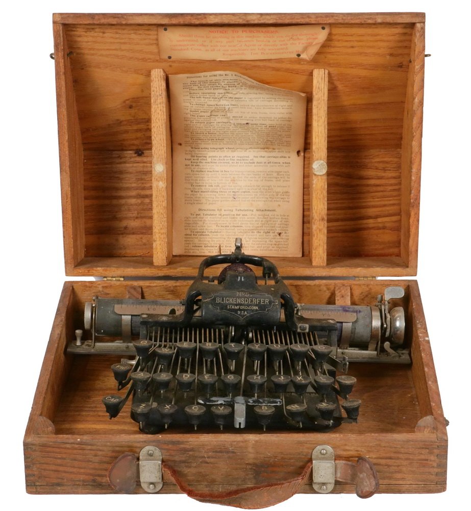SCARCE EARLY TYPEWRITER - The "Blickensderfer 5", the: SCARCE EARLY TYPEWRITER - The "Blickensderfer 5", the first widely successful production model portable typewriter, in the original oak case with paper labels, introduced at the 1893 World's Columbian