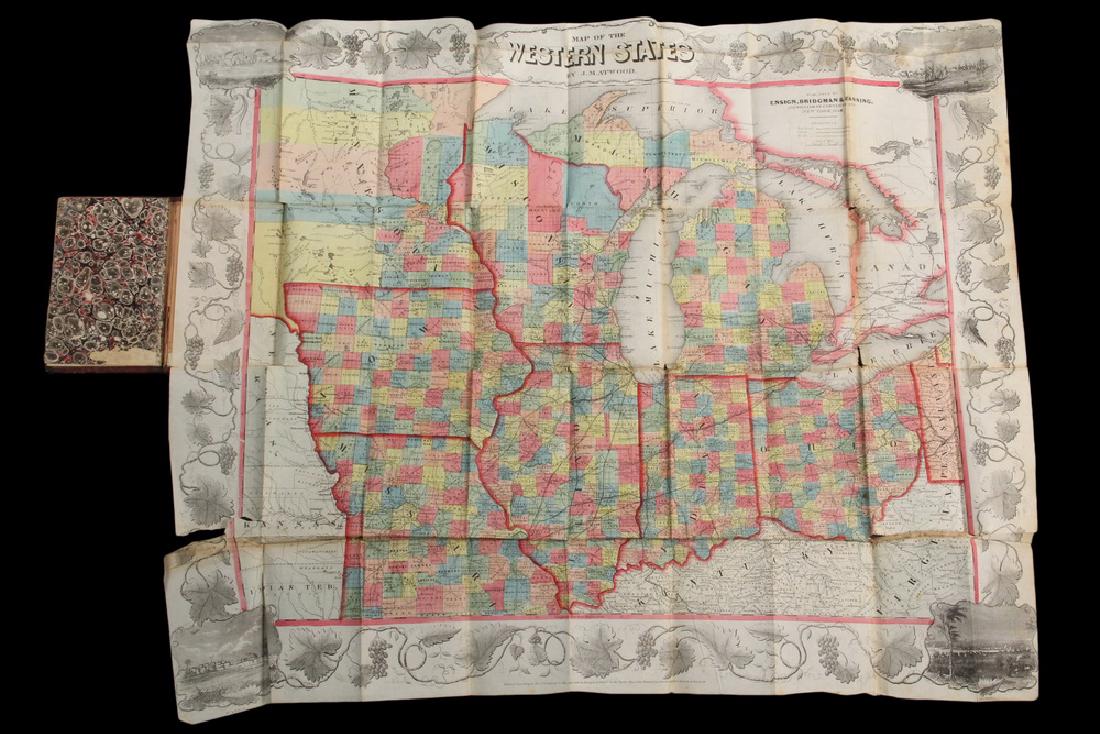 RARE PRE-CIVIL WAR "WESTERN" U.S. POCKET MAP: "Ensign, Bridgman & Fanning's Traveller's Guide Through the Western States", published 156 William St. at Ann St, New York, 1856. In brown leather with gilt blindstamped title and decoration, having a