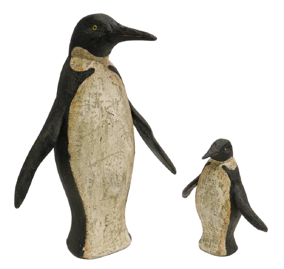 (2) FOLK ART FIGURES: Standing Penguin and Chick, in painted pine, with glass eyes, late 20th c., fatigued. 24" & 12" tall. Good condition.