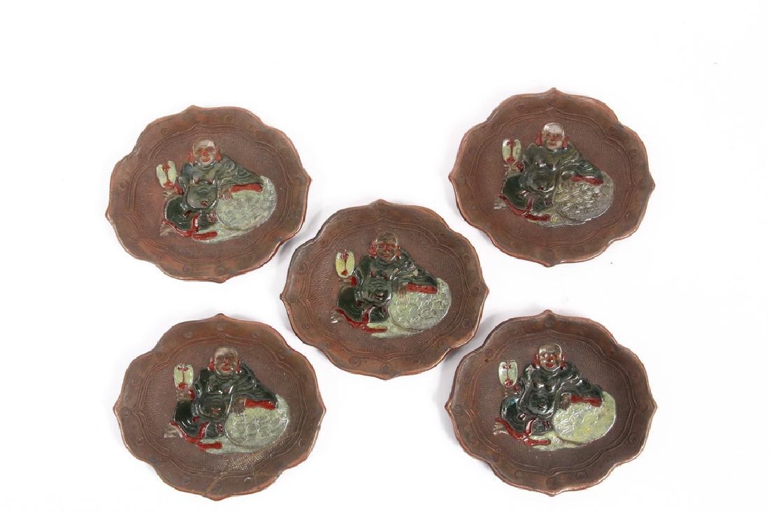 (SET OF 5) JAPANESE POTTERY SIDE DISHES: Mokko Shaped Candy Dishes with raised enameled portrait of reclining buddha, a pleasing design and texture. Meiji/Taisho period. 4" x 3 3/8". One has old wabi-sabi lacquer repair. In old pasteboard bo