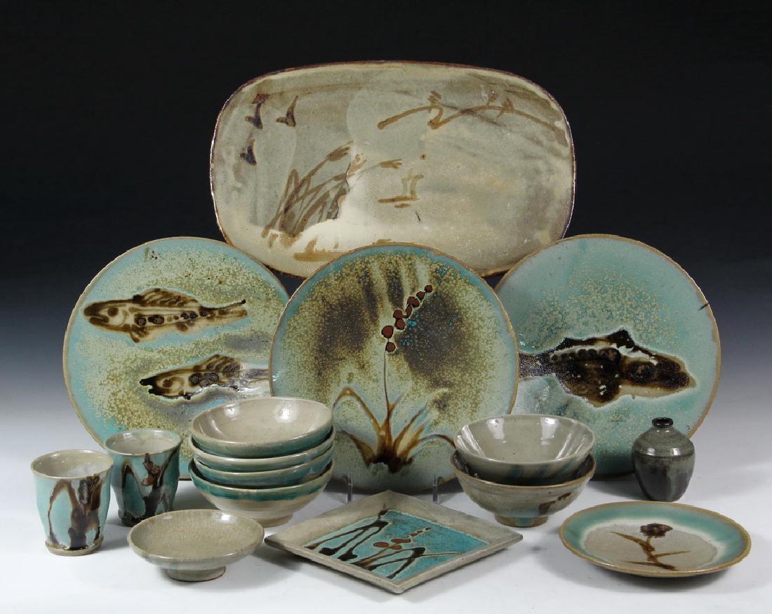 (37 PCS) JAPANESE MODERNIST POTTERY: 1950s Art Pottery, influenced by Karatsu ware, earthenware with freeform glaze, natural form representations, including: (6) 11" Plates with Leaves (2 chipped); (3) 11" Plates with Berries; (5) Cups w