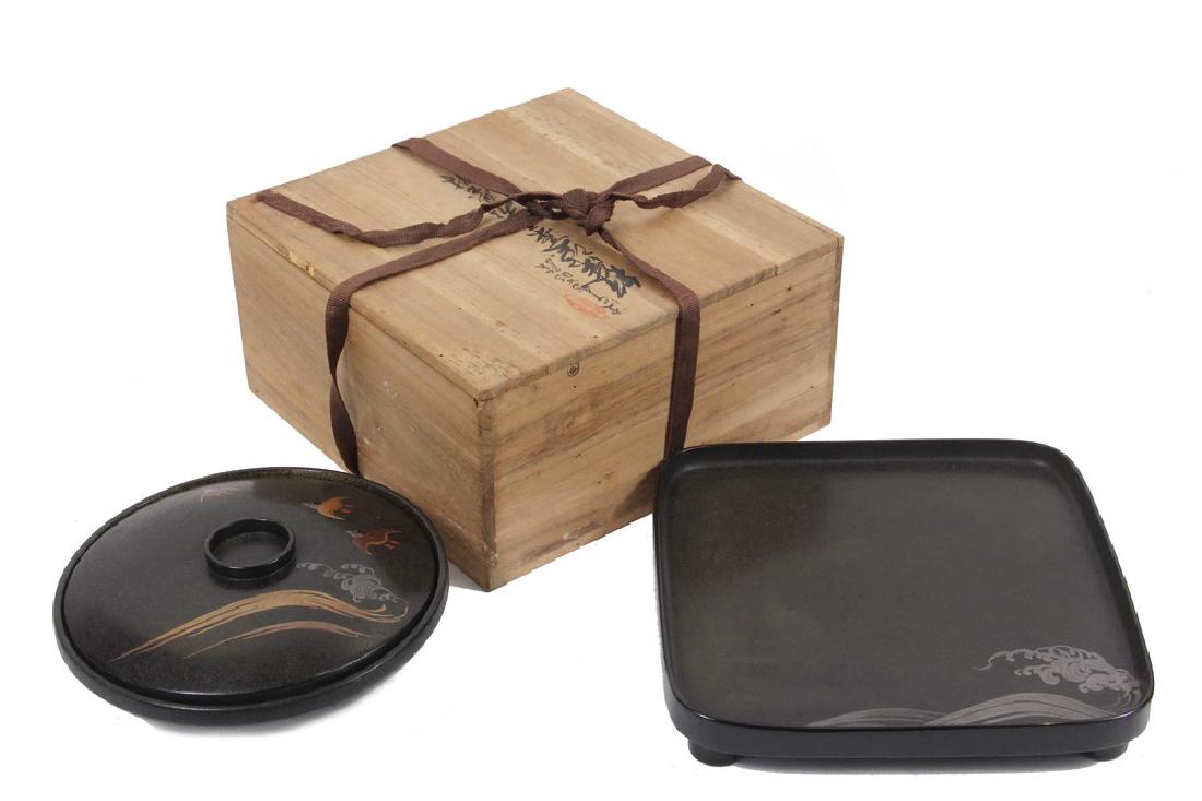JAPANESE LACQUER COVERED BOWL AND TRAY: Fine Quality Matching Set of taka-maki lacquer in charcoal black with ishime ground and chidori (small sea birds) flying over waves, the interior finished in excellent nashiji (gold sprinkled), Meiji/