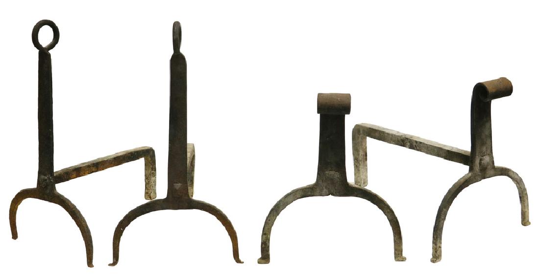 (2) PAIR SMITHY-MADE ANDIRONS: Forged Iron, 19th c., both with arched legs, riveted dogs, one with curled rod tops from flat, the other with broad flat scrolled top from flat, 19" & 14" tall. Some corrosion, well used but sturdy.