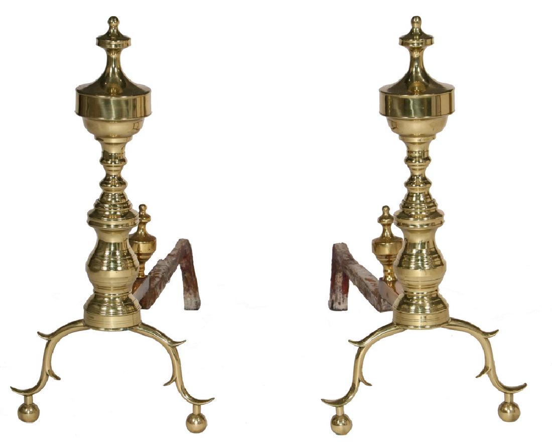 PERIOD ANDIRONS: Chippendale Solid Brass Andirons with banded urn top, spun stacked ring columns, having matching log stops, raised on spur and ball arched legs, hand cut threading, 21 1/2" x 21" x 10 1/2". Good condi