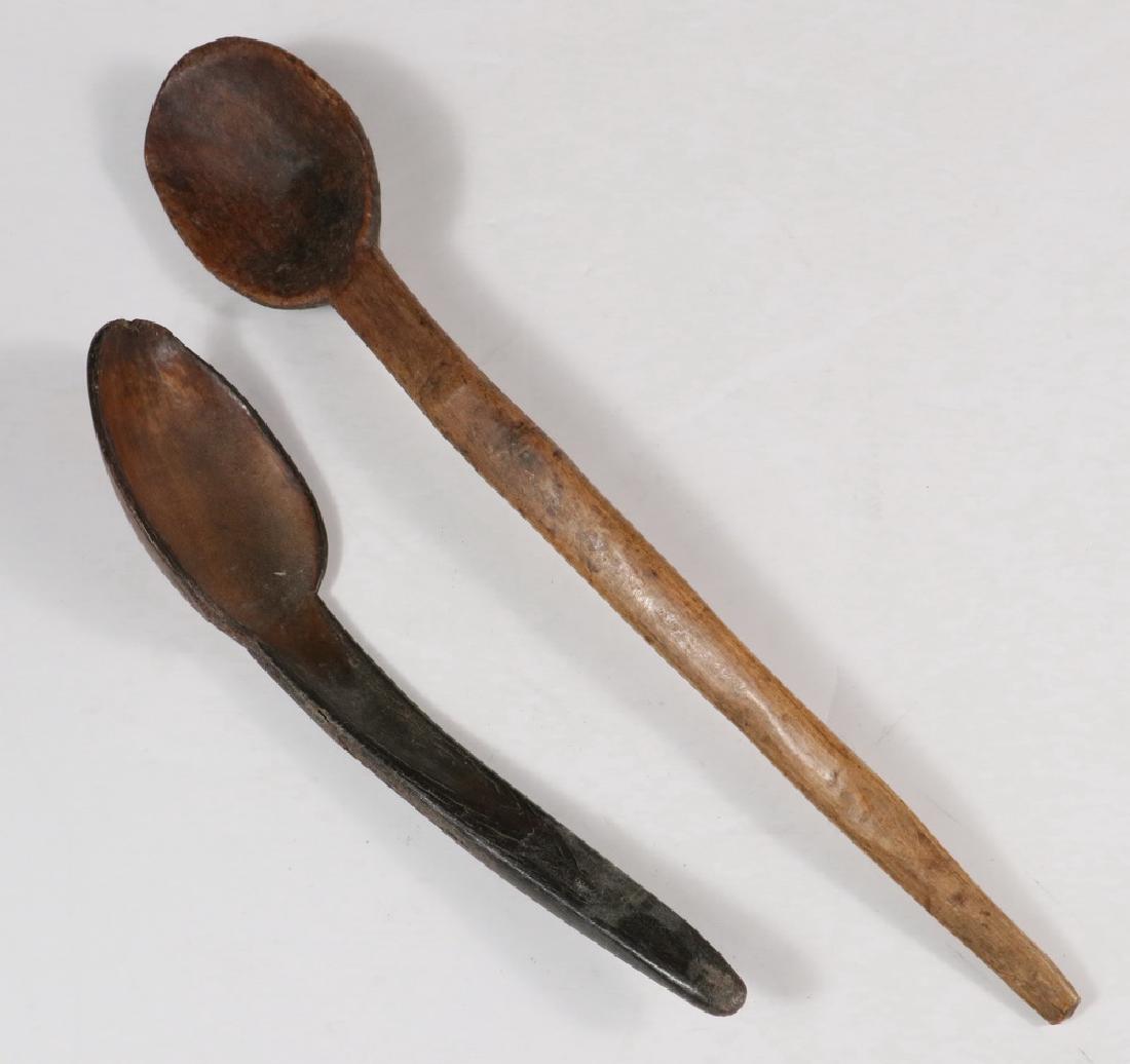 (2) COLONIAL ERA SPOONS: (2) COLONIAL ERA SPOONS - New England, early 18th c., Settlers or Indian, Carved Hardwood, 13 1/4" long, and Carved Horn, 9" long. Wonderful age patina. From the George Neuman collection.