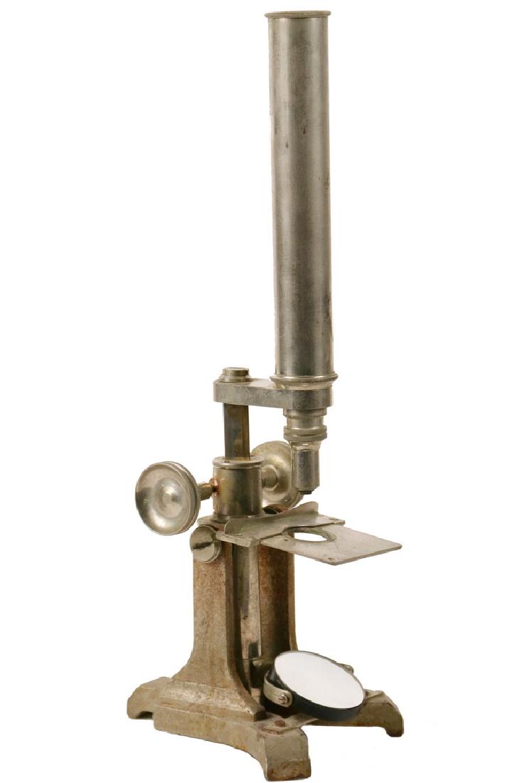 ANTIQUE MICROSCOPE: Society of the Arts Pattern Microscope, made popular as an award in 1855, copied by many makers, this is unmarked, circa 1880, cast iron claw foot base in silver paint, the remainder is nickel plated.