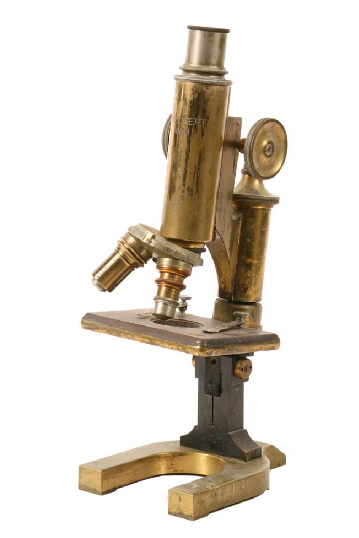 ANTIQUE MICROSCOPE: C. Reichert Wien Vienna Microscope No. 26461, circa 1890, lacquered brass and bronze, with gutta percha stage, rack and pinion focus, triple objective (missing one lens, the other two are Spencer and 