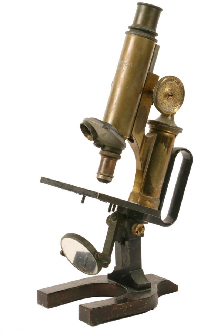 ANTIQUE MICROSCOPE: C. Reichert Wien Vienna Microscope No. 35870, circa 1910, (also marked "58, D.R.G.M., 246019"), lacquered brass and black enameled bronze, having an integral handle, rack and pinion focus, double obje