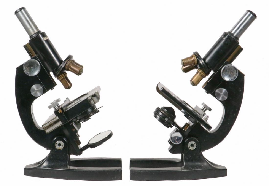 (2) VINTAGE MICROSCOPES: Both circa 1930s, including: Bausch & Lomb, s/n UL 785 & UL 9952, both with triple objectives retaining their original B&L 10/43/97 lenses, rack and pinion focus, with mechanical stage registers, mech