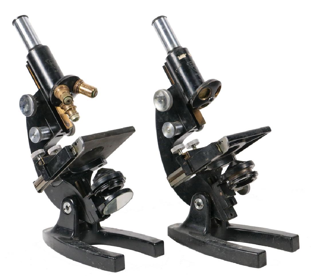 (2) VINTAGE MICROSCOPES: Both circa 1930s, including: Bausch & Lomb, s/n UL 851 & UK237, both with triple objectives but only one retaining the original B&L 10/43/97 lenses, rack and pinion focus, with mechanical stage regist
