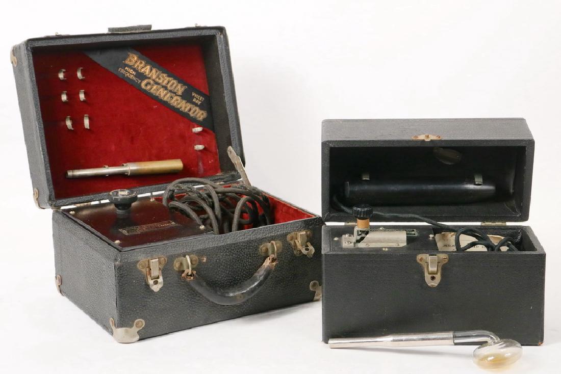 (2) QUACK MEDICINE DEVICES: Circa 1920's, in the original black cases: Branston Violet Ray High Frequency Generator", Model 7, s/n 14898, Toronto, Ontario, with handle, but missing glass wands, 7" x 12" x 9"; PLUS Star-Rite Viol