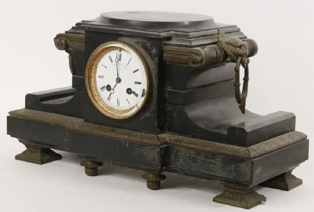MANTEL CLOCK: French-made Marble Cased Mantel Clock, made for Shreve Crump & Low, Boston, late 19th early 20th c., with bronze mounts, 8-day time & strike movement, white face with Roman numerals, brass and beveled
