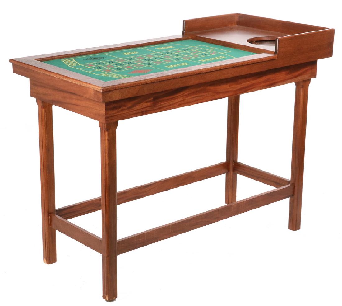 ROULETTE TABLE: Modern Mahogany Table with printed felt playing board, pocket for missing roulette wheel, 39" to playing surface, 56" x 27" x 42 1/2" tall overall. Good condition.