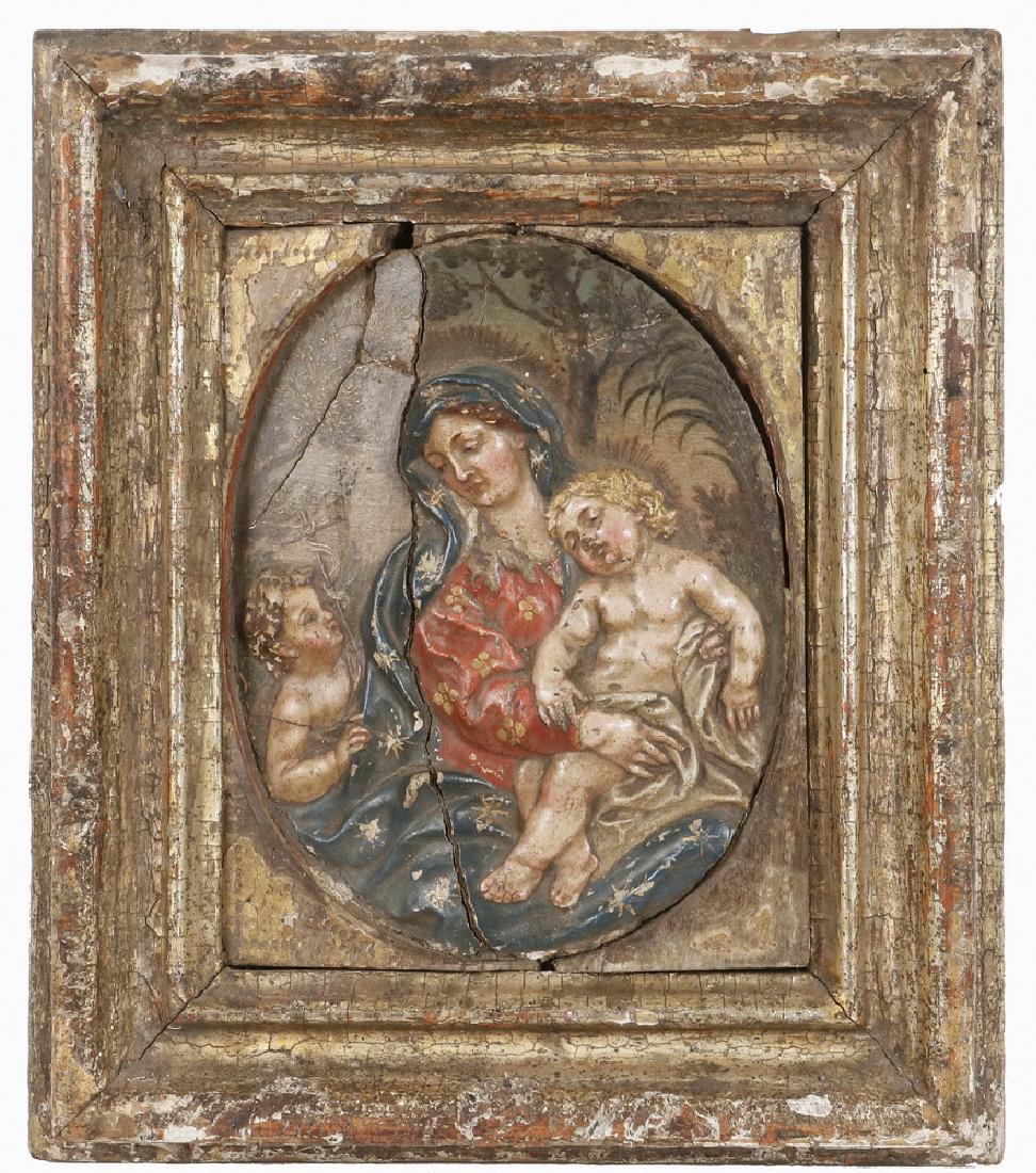 AFTER GIOVANNI BATTISTA FOGGINI (FLORENCE, ITALY,: "Virgin and Child with the Infant St. John", polychromed stucco relief, an early 18th c. Italian Carved and Polychromed Wood Oval Icon after the original, in the original rectangular gilt frame. 14" x