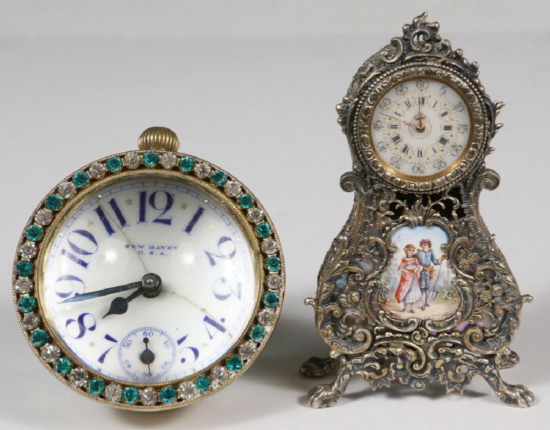 (2) DESK CLOCKS: Group of (2) Small Desk Clocks, including: Late 19th c. New Haven ball form paperweight clock, dial surrounded by green and clear rhinestones, with blue enamel numbers on white dial, stem wind, 3-1/4"
