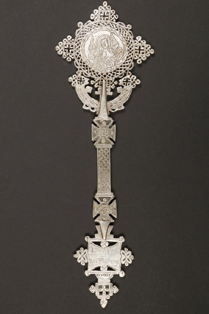 ETHIOPIAN CROSS: 19th c. African Large Patee Hand Blessing Cross, Coptic Orthodox Christian, in lost wax cast silver, engraved, with reticulated quadrilobe axum having a central portrait of the Madonna and Child, St. 