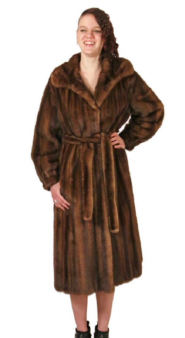 MINK COAT: Full Length Chocolate Brown Ranch Mink Coat, with mink tie belt, shawl collar, dark brown satin lining, hook and eye closure, S.J. Glaser, New York label, 46 1/2" long, 24" long sleeves. A long 1" tea