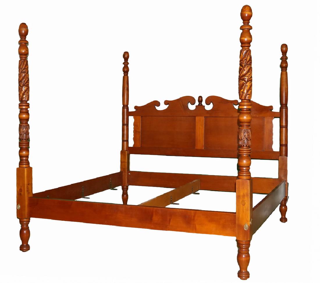 FOUR POST BED REFITTED AS KING SIZE: Federal Style Solid Cherry, having leaf carving, urns and egg finials on head posts, simple urn, ring and ball turned foot posts, paneled headboard having broken arch pediment with center finial, 80"