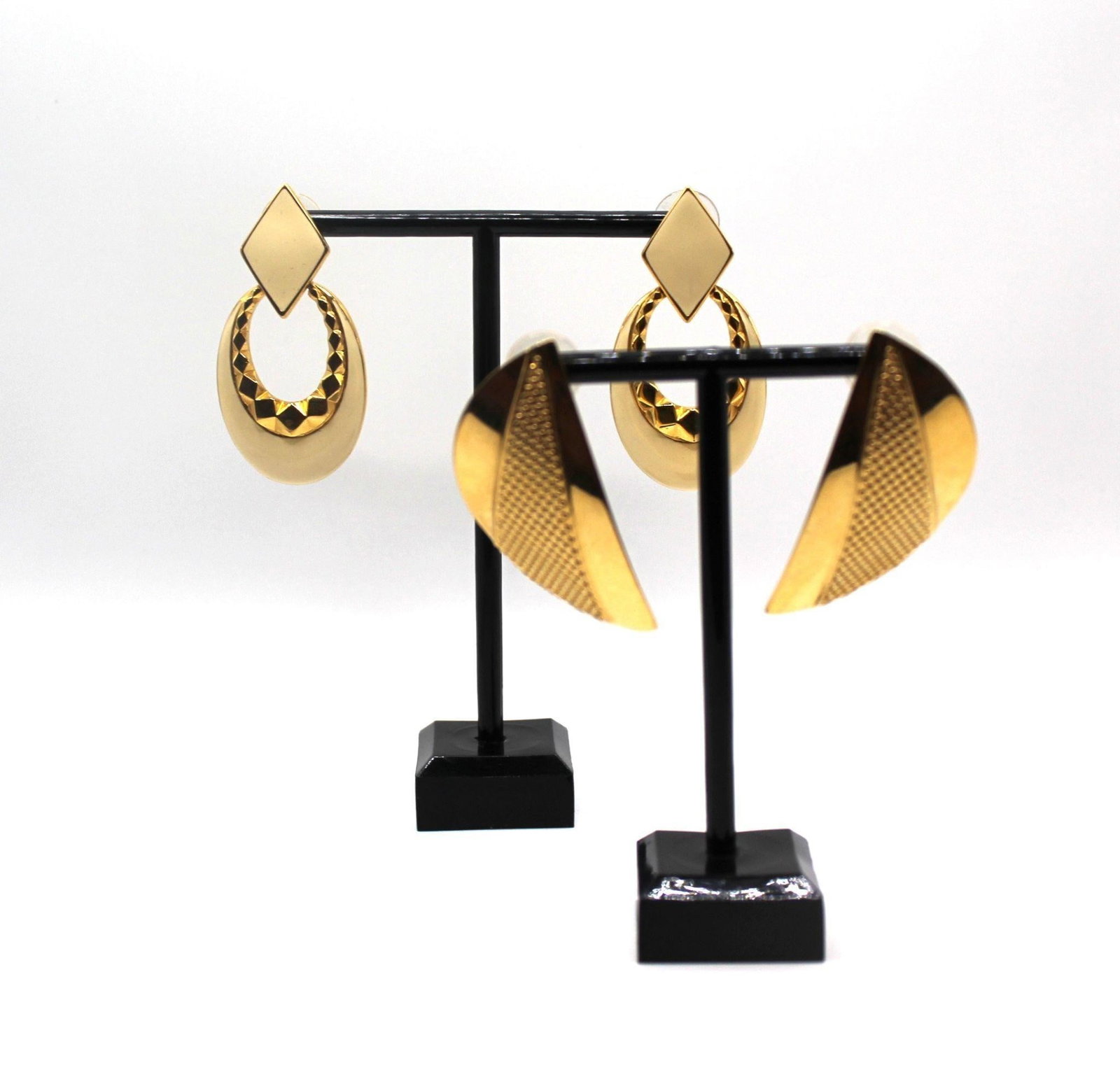 2 Lots of Vintage Geometric Monet earrings gold tone settings and 1 with enamel: 2 Lots of Vintage Geometric Monet earrings gold tone settings and 1 with enamel designDesigner/Brand: MonetMetal Purity: gold tone settingMetal: gold tone settingStone: noneWeight: 37.2gramsDimensions