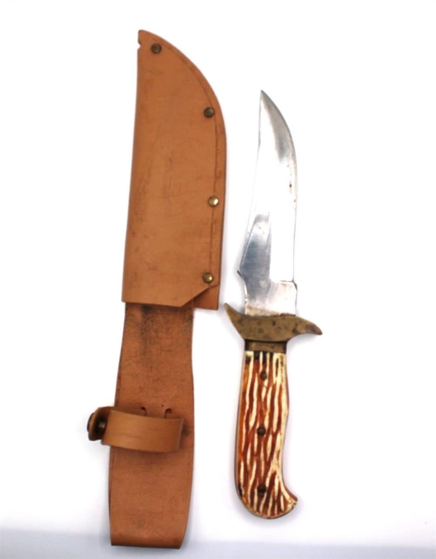 HUNTING KNIFE MADE IN PAKISTAN W/ LEATHER SHEATH: Well made Hunting knife made in Pakistan with leather sheath for belt carry. With signs of useDimensions: Knife -8.5" & Sheath - 10"