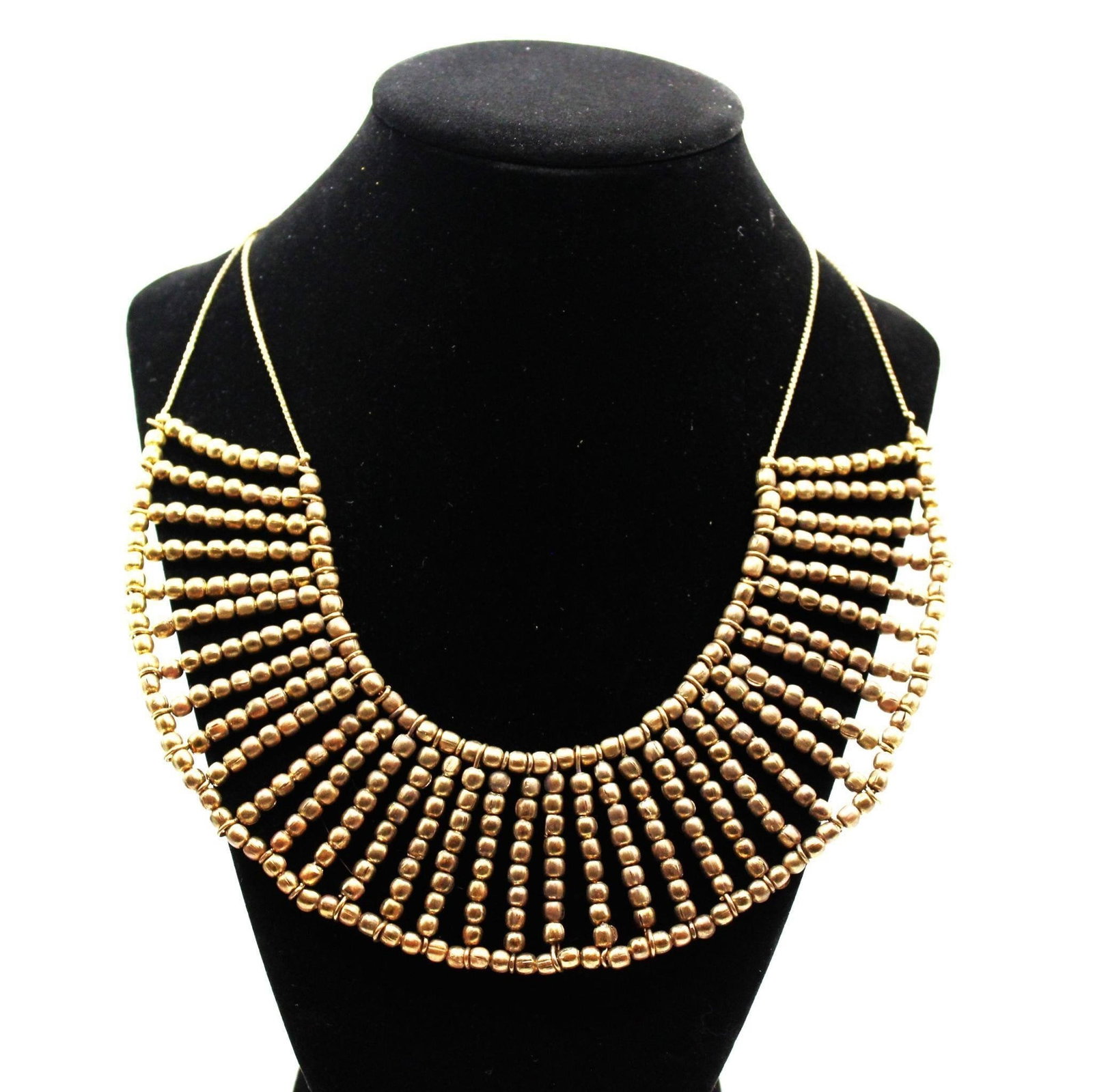 BRONZE LAYERED BIB NECKLACE BY MACY'S: Vintage Bronze layered bib necklace by Macy's, with tag not used. Good overallDesigner/Brand: Macy'sMetal Purity: BronzeDimensions: 16" LWeight: 82grams