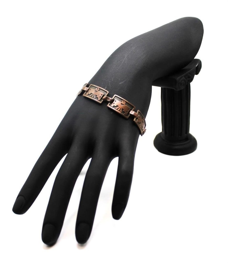 AUTHENTIC 1950'S THUNDERBIRD COPPER BRACELET: Vintage Authentic 1950's Thunderbird Copper Bracelet panel links Southwestern Harvey Era size 7Designer/Brand: Southwestern jewelry Metal Purity: CopperMetal: CopperStone: noneWeight: gramsDimensions: