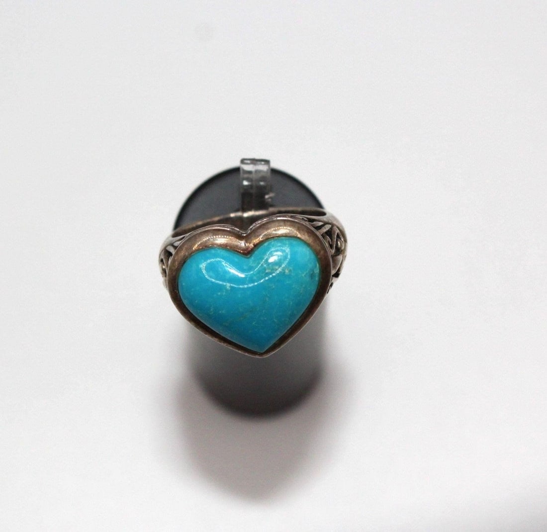 SX 925 THAILAND STERLING HEART TURQUOISE RING 8: SX 925 Thailand sterling heart turquoise ringDesigner/Brand: Marked SX 925 ThailandMetal Purity: 925Metal: Sterling SilverStone: Turquoise Weight: 7.2gramsDimensions: Size 8