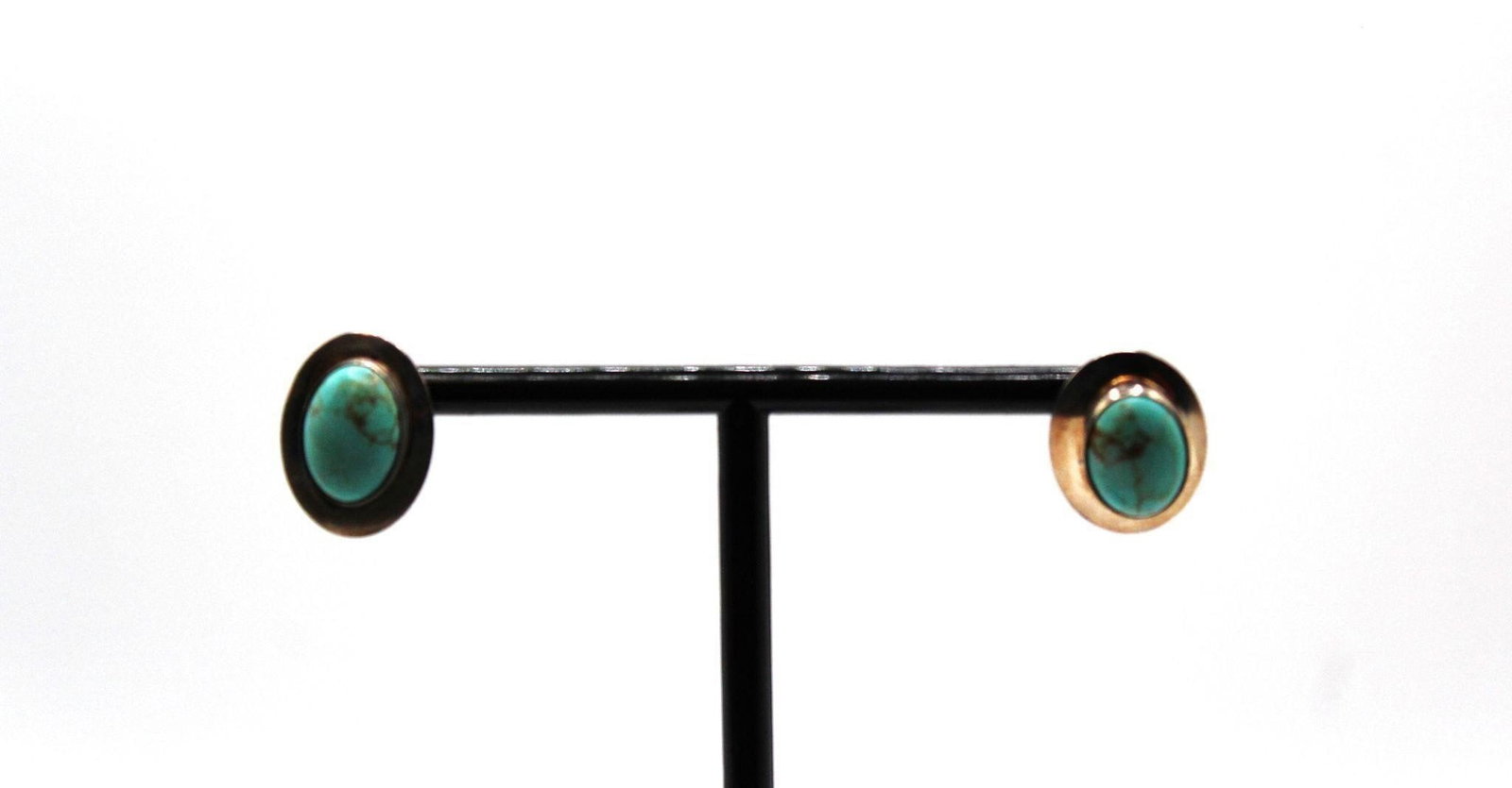 OVAL TURQUOISE STERLING STUD EARRINGS: OVAL TURQUOISE STERLING STUD EARRINGS, In good condition WITH RESERVE Designer/Brand: Signed STERLINGSetting: Sterling silver 925Stone: TurquoiseDimensions: L 1" X W 0.75"Weight: 4.6 grams