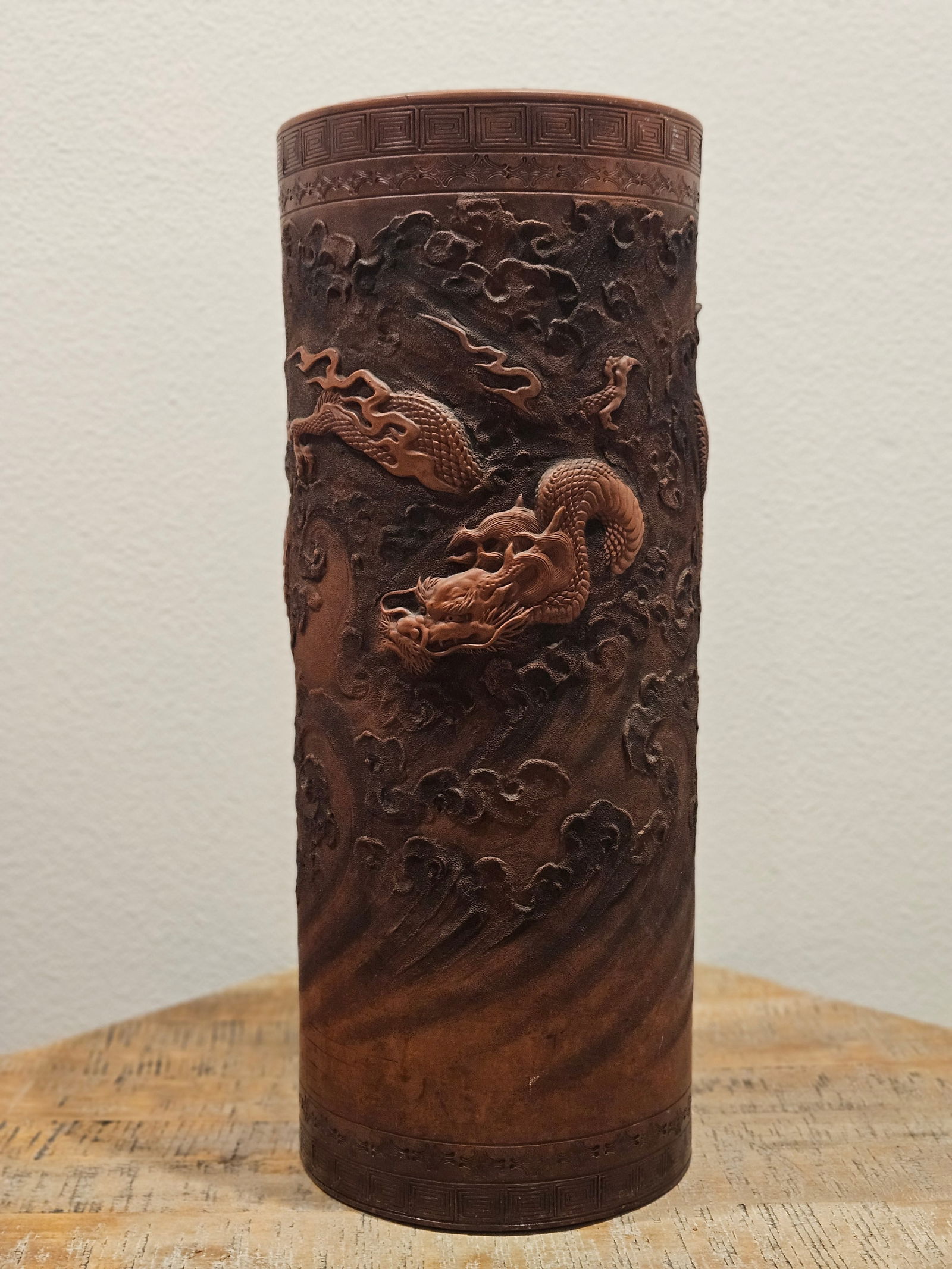zisha arrow vase: A zisha arrow vase with a cloud dragon pattern. 24"H 9.5"dia