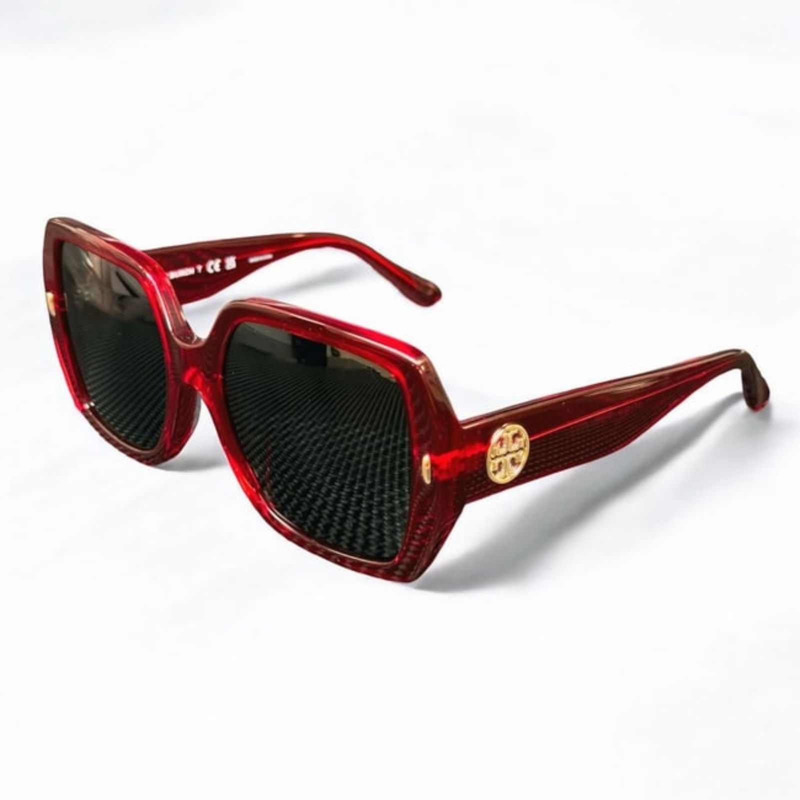 Transparent Red Tory Burch Sunglasses: • Tory Burch• Transparent Red• TY7191U 193687• Women’s 54 mm• Frame Style: Full Rim• Material: Plastic Frame• Lens Type: Round• Original Case & Care Cards Inc