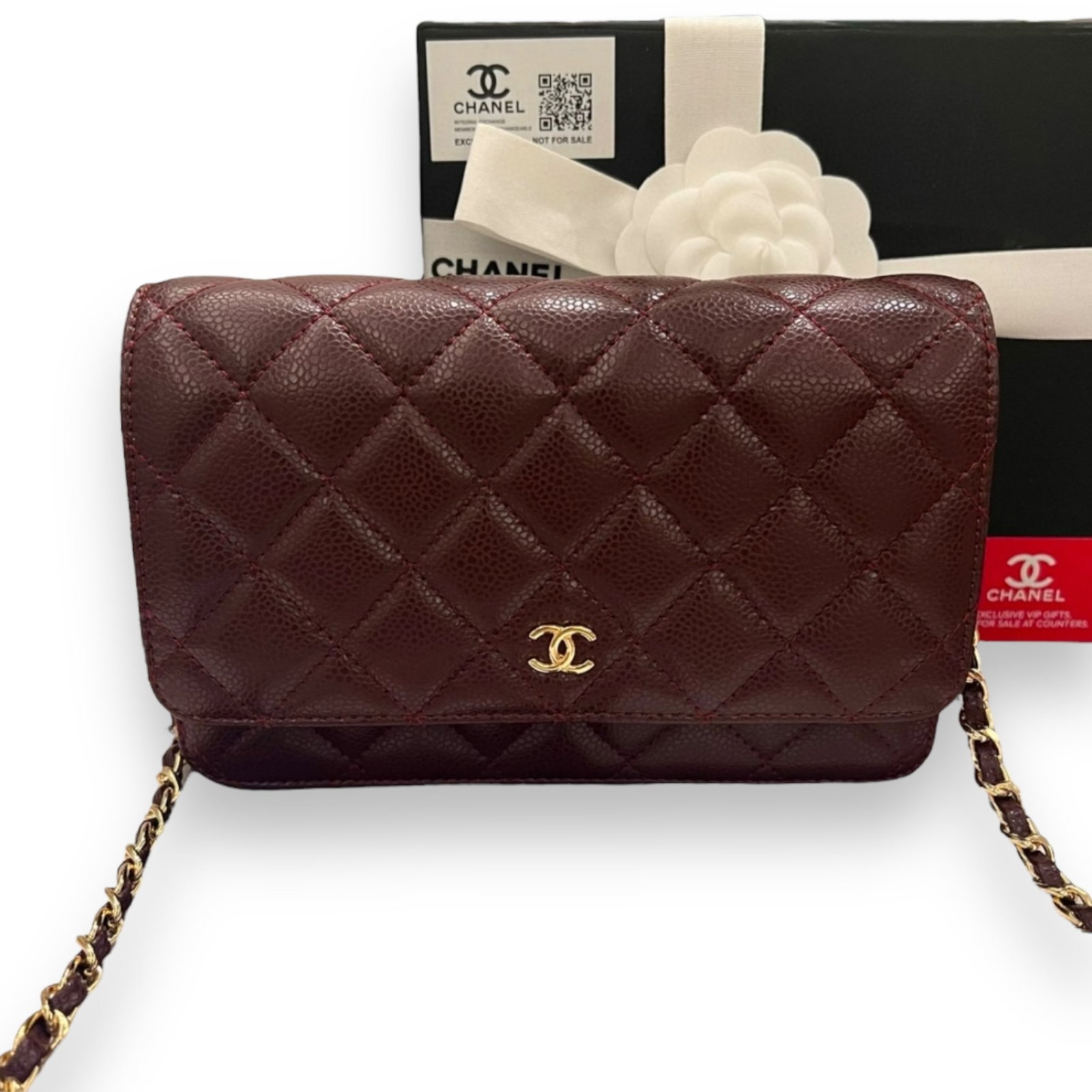 Burgundy CHANEL WOC (Wallet On Chain) Beaute Bag: • CHANEL• Burgundy• Gold Tone Hardware• Wallet On Chain (WOC)• 7.5” x 5” (in)• Original Box & Dust Bag Included• Snap Closure• Internal Card Slots&b