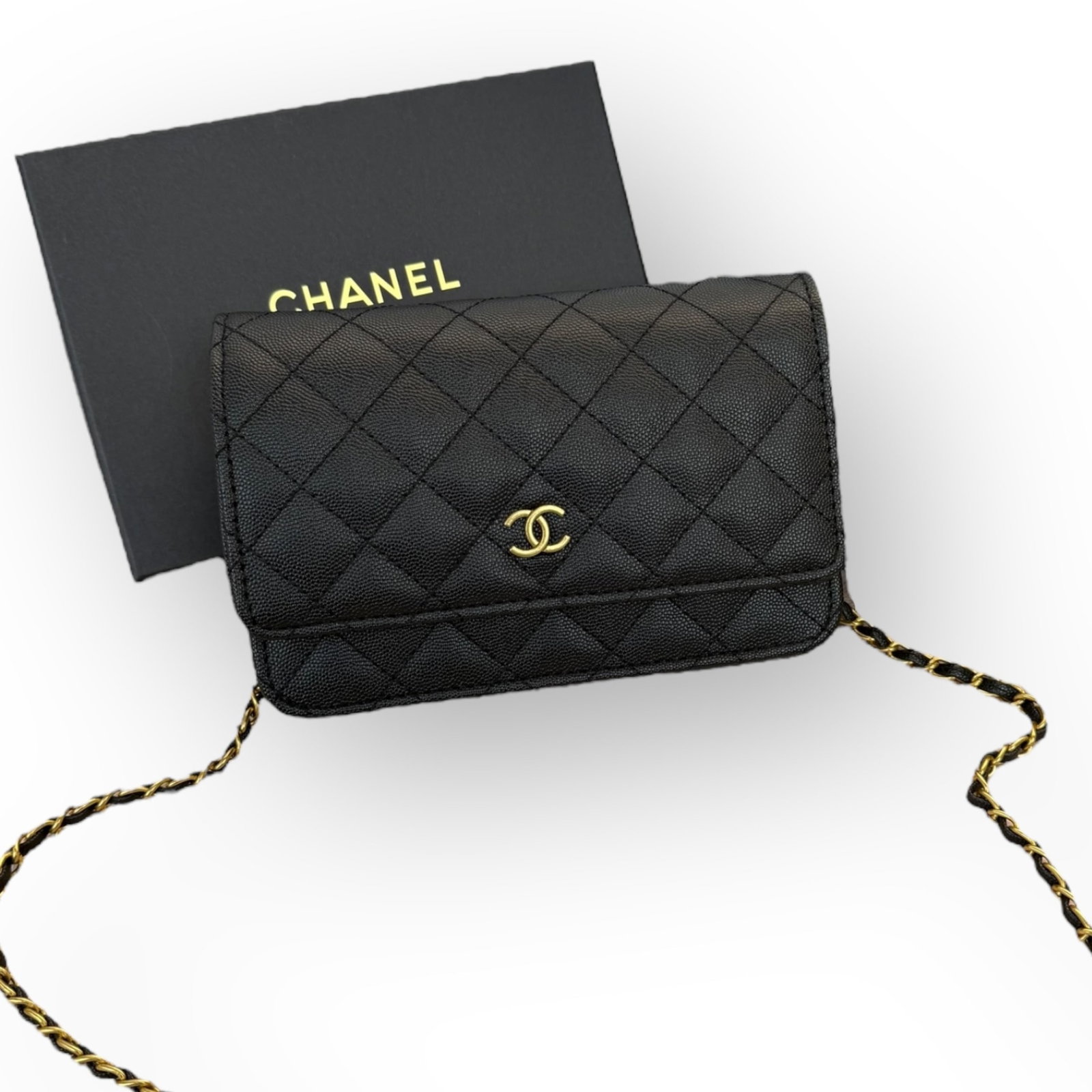CHANEL Quilted Black/Gold WOC (Wallet On Chain) Beaute Bag & Original Box: • CHANEL • Black • Gold Tone Hardware • Quilted Pattern • Wallet On Chain (WOC) • Front CC Logo • Intertwined Leather Chain Strap • 7.5” x 5” (in) &