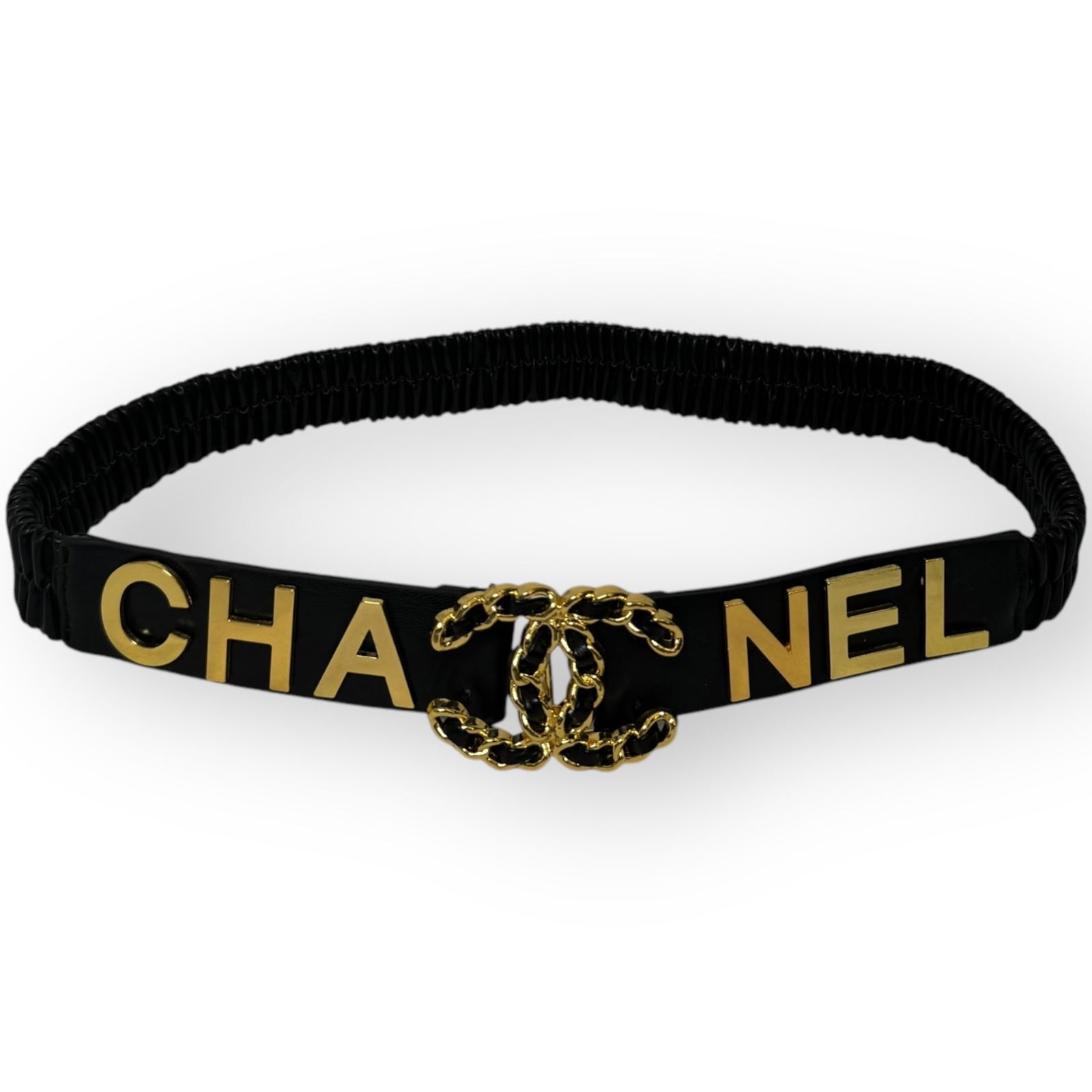 CHANEL Intertwined Front CC Beaute Belt & Box: • CHANEL • Belt • Black • Gold Tone Hardware • Stretchy/One Size Fits All • Front Intertwined CC Logo • Front CHANEL Logo • Box Included • Makeup/Diffusion