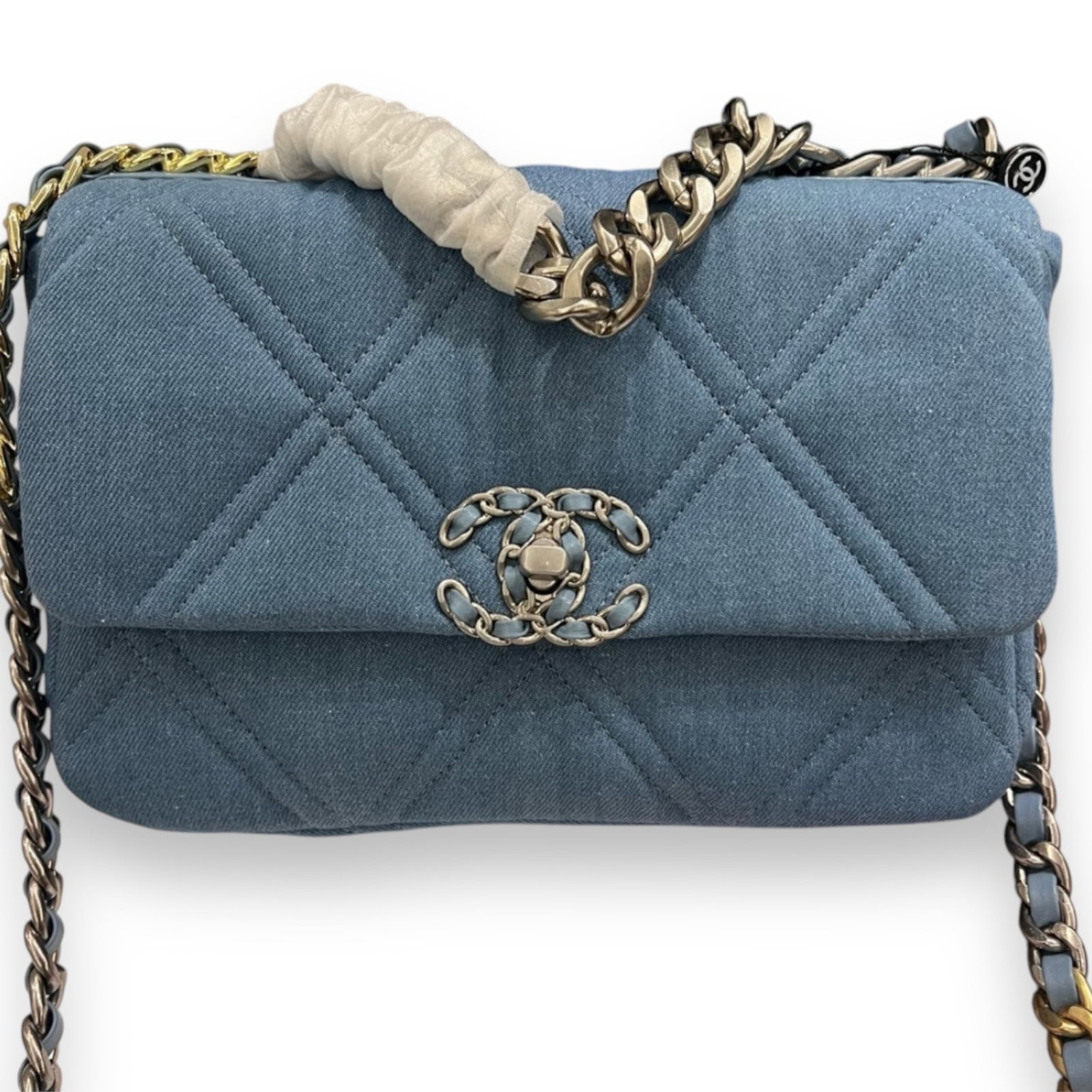 CHANEL Blue Denim Quilted CHANEL 19 Beaute Shoulder Bag: • CHANEL• Blue • Denim• 19 SB• Quilted Pattern• Gold & Silver Tone Hardware• 10.2” x 7” x (in)• Original Box & Dust Bag Included• Signature CC