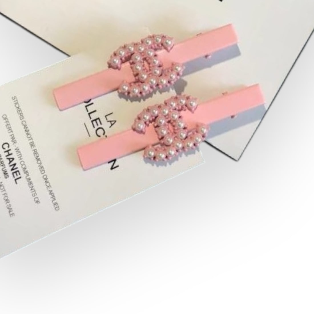 CHANEL 2Pc Set Pink/Pink Pearl CC Logo Long Rectangle L.A Collection Hair Clips: • CHANEL • 2Pc Set • Gabrielle • Pink • Hair Clips • Long Rectangle Shape • Pink Pearl CC Logo • Pink Tone Hardware • L.A Collection • Unopened/In Ori