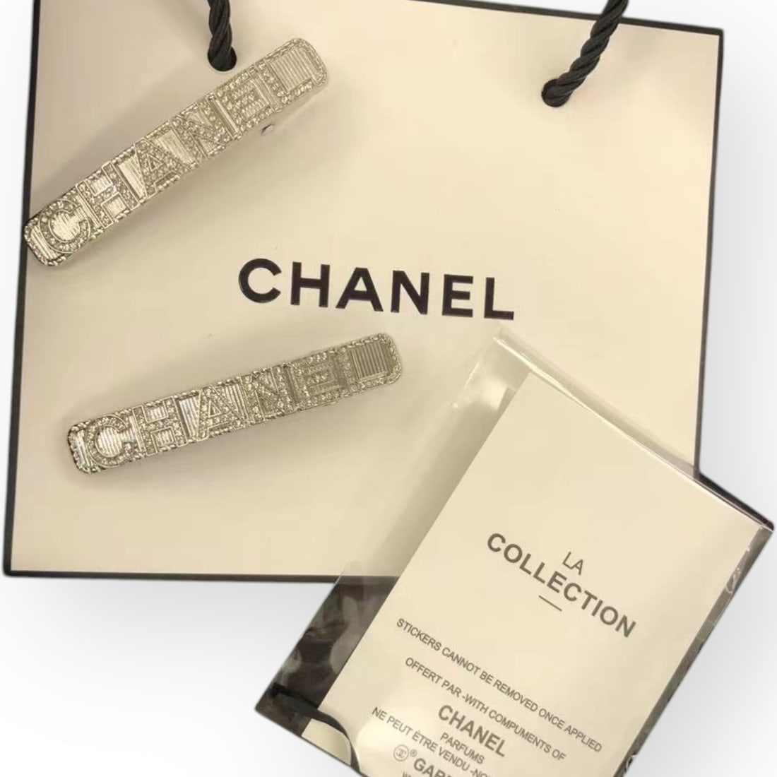 CHANEL 2Pc Set Silver/White Rhinestone Logo Long Rectangle L.A Collection Hair Clips (1 of 3)