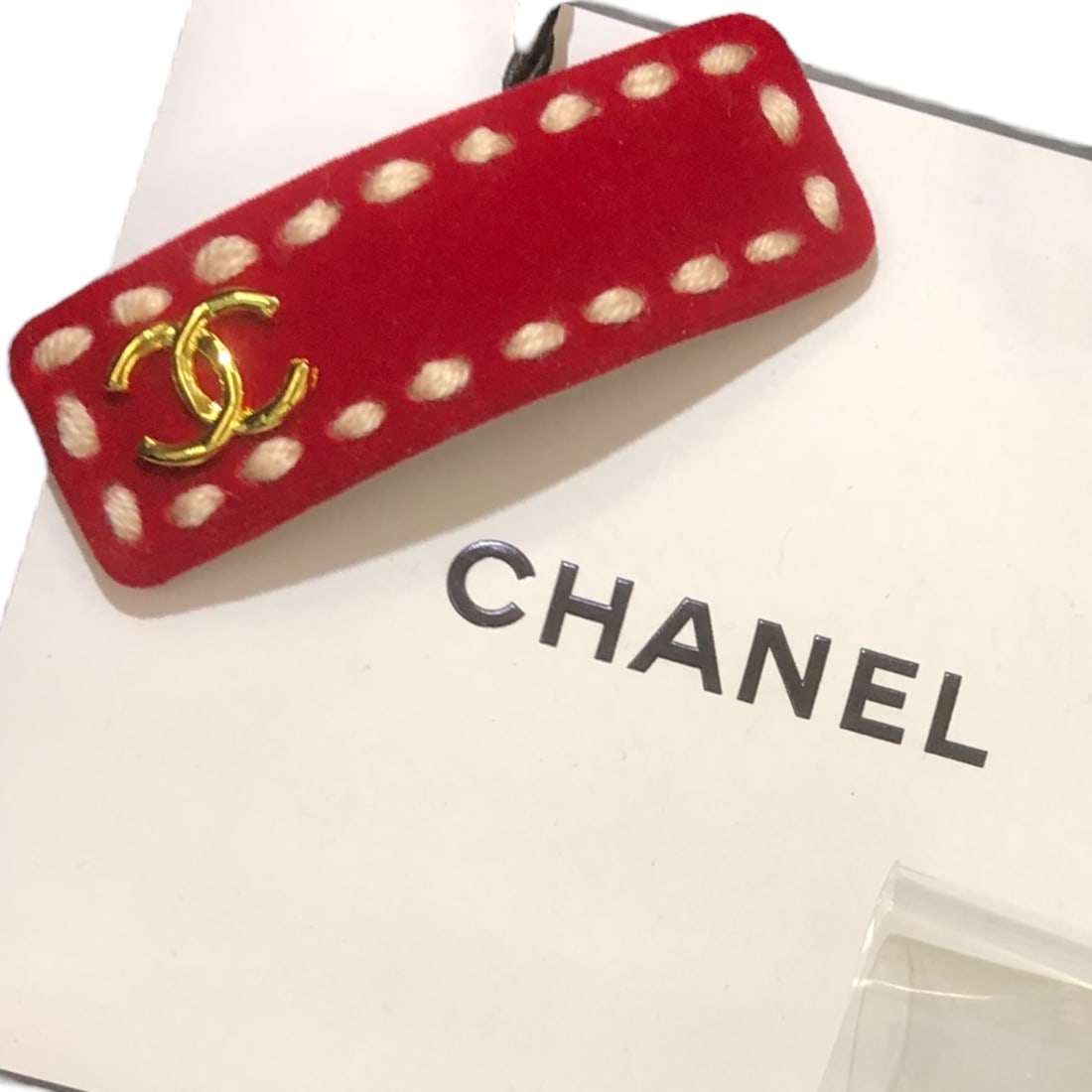 CHANEL Red Long Rectangle L.A Collection Hair Clip: • CHANEL • Gabrielle • Red • Hair Clip • White Trim • Gold CC Logo • Silver Tone Hardware • Long Rectangle Shaped • L.A Collection • Unopened/In Origi