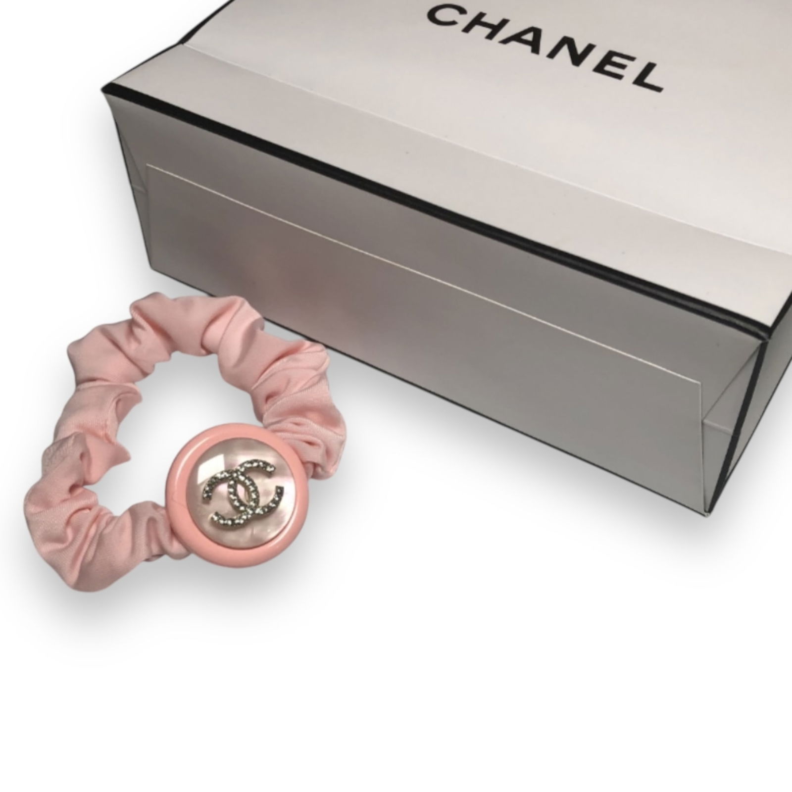 CHANEL Rhinestone CC Pink L.A Collection Hair Tye/Scrunchy: • CHANEL • Pink • L.A Collection• Hair Tye/Scrunchy • Rhinestone CC Logo• Unopened/In Original Packaging • CHANEL Gift Bag Included