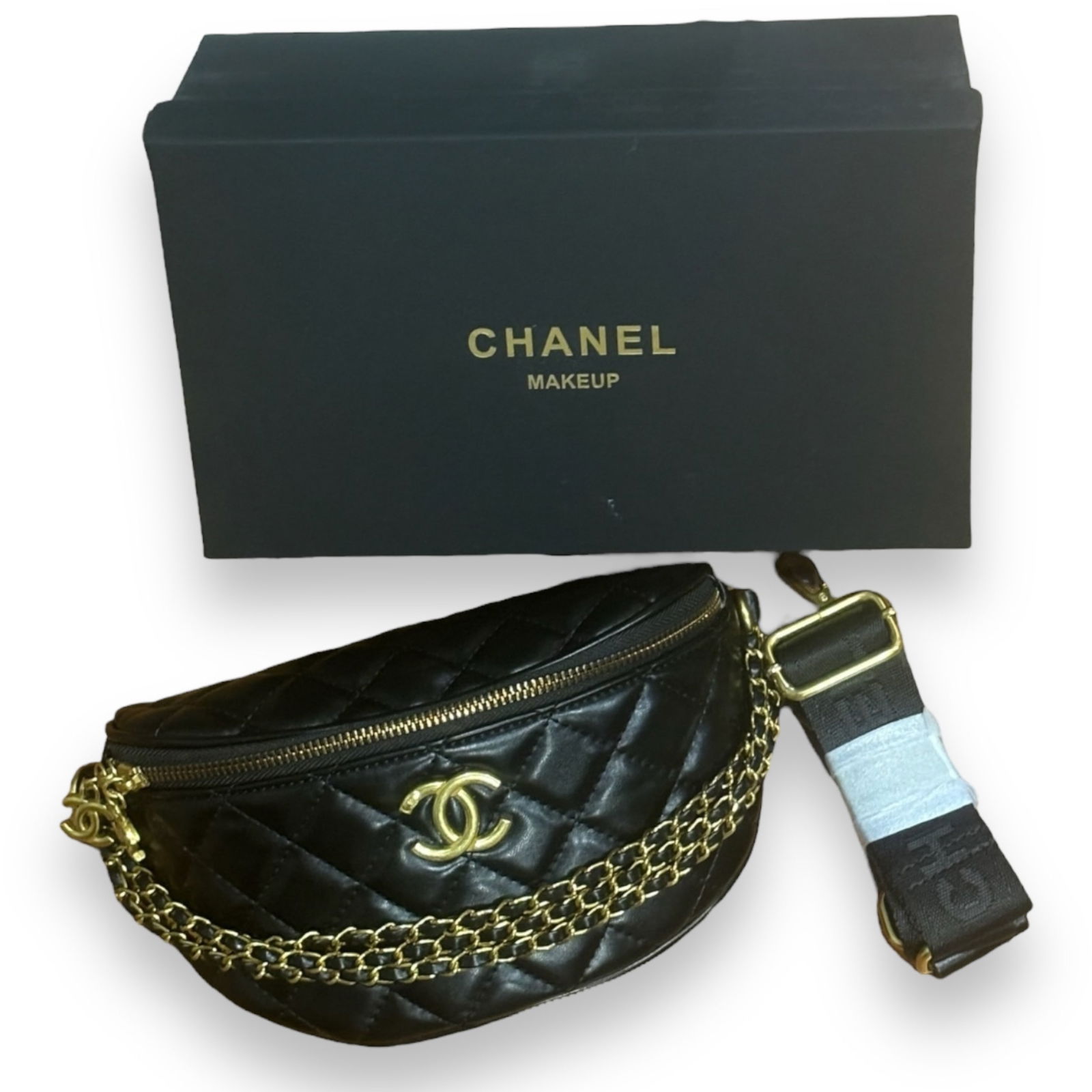 Black Quilted CHANEL Beaute Belt/Bum Bag & Original Box: • CHANEL• Quilted Pattern• Black• Gold Tone Hardware• Belt / Bumbag• Upper Edge Length 14” (in)• 6.3” x 5.1” x 3” (in)• Zip Closure&bull