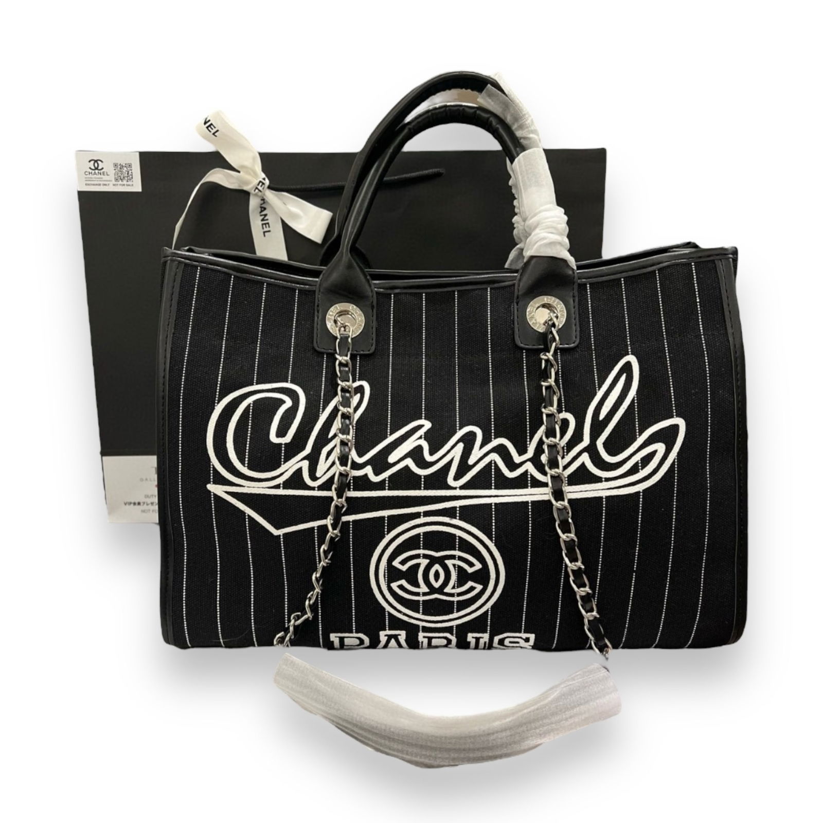 CHANEL Black & White Deauville Striped Beaute Bag: • CHANEL• Black& White• Silver Tone Hardware• Deauville Tote• 14.5” x 10.2” x (in)• Original Box & Dust Bag Included• Red Interior• Snap Closure&bul