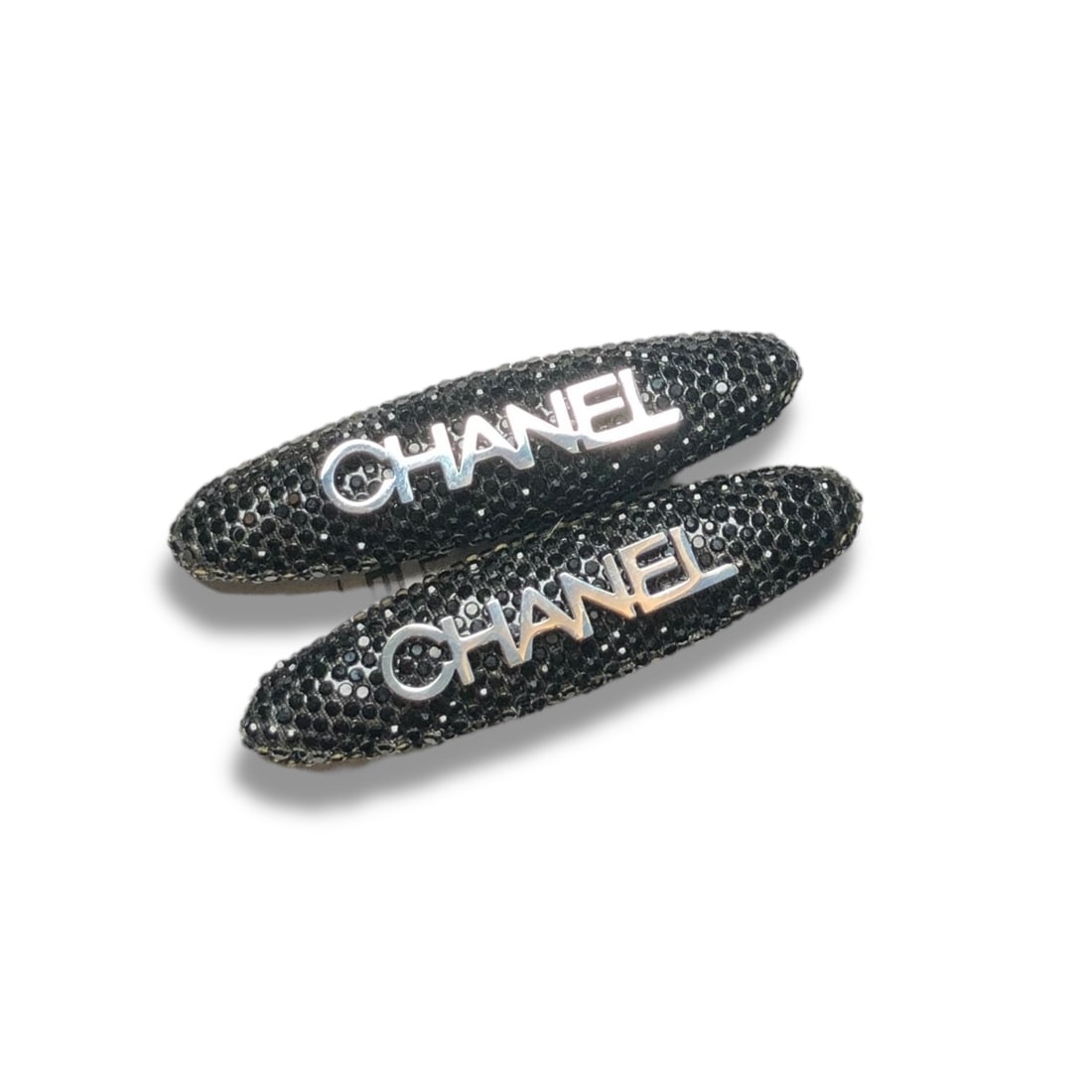 CHANEL 2Pc Black Rhinestone/Silver Logo Long Oval L.A Collection Hair Clips: • CHANEL • Gabrielle • 2Pc Set • Hair Clips • Black Rhinestone • Silver CHANEL Logo • Black Tone Hardware • Long Oval Shaped • L.A Collection • Unopen