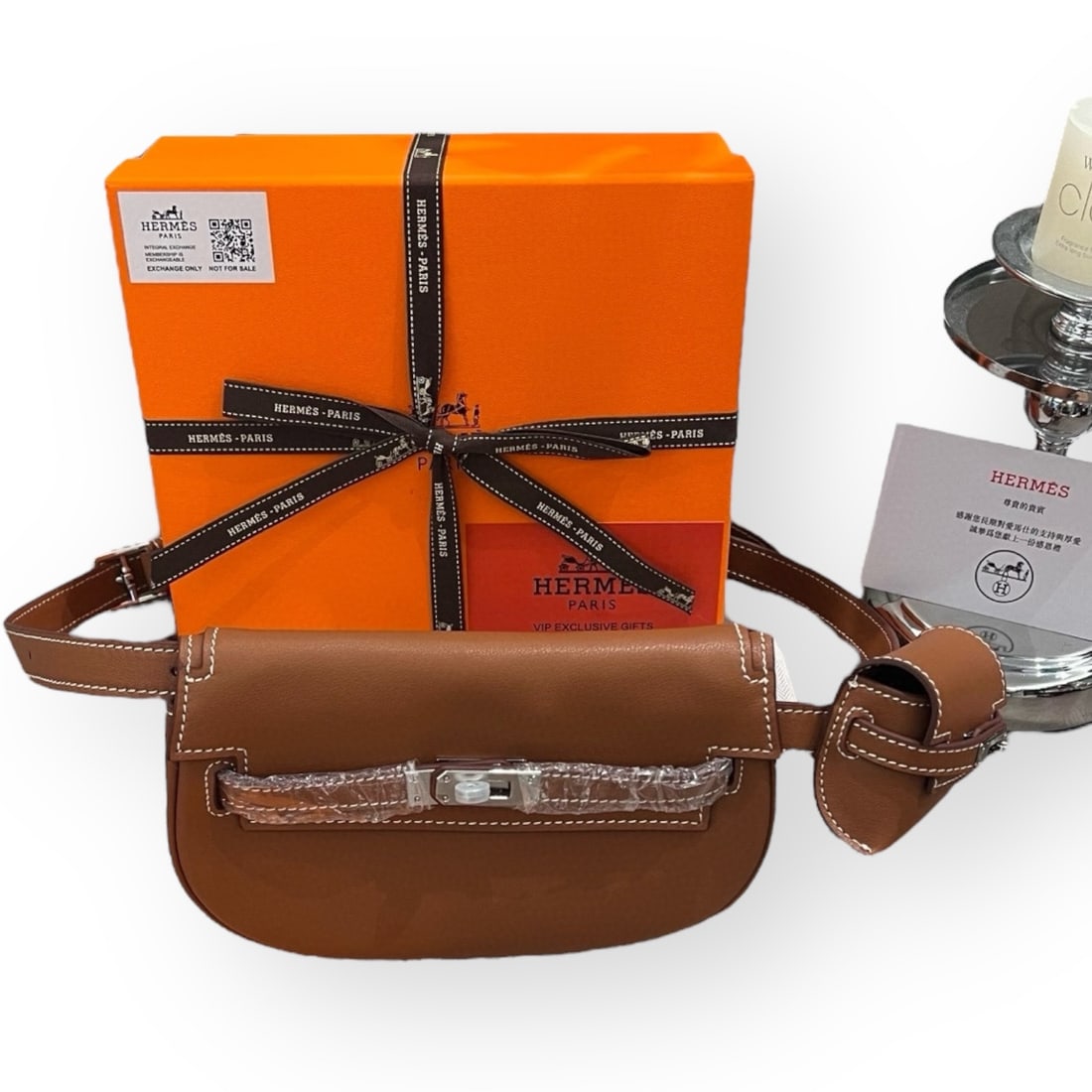 Hermes Brown/Silver Kelly Moove Belt Beaute Bag, Pouch, & Original Box: • Hermes • Kelly Moove • Belt Bag • Adjustable Single Strap • Side Pouch • Waist or Shoulder Carry • Signature Turn Lock Closure • Silver Tone Hardware • I