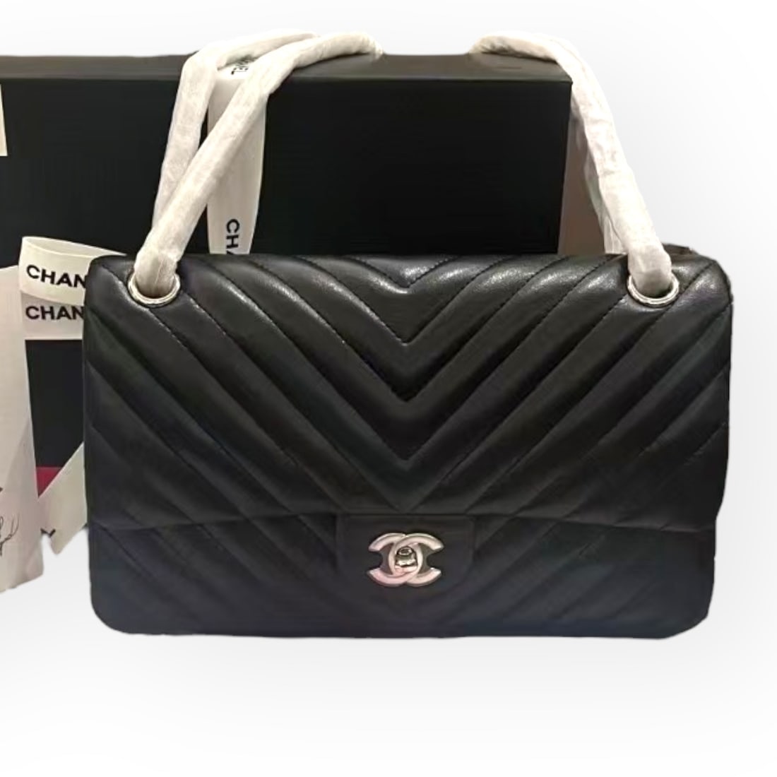CHANEL Black/Red Chevron Print Double Flap Beaute Bag & Original Box: • CHANEL • Black • Silver Tone Hardware • Double Flap Bag • Chevron Pattern • Exterior Slip Pocket • Signature CC Turn Lock Closure • Intertwined Leather Chain