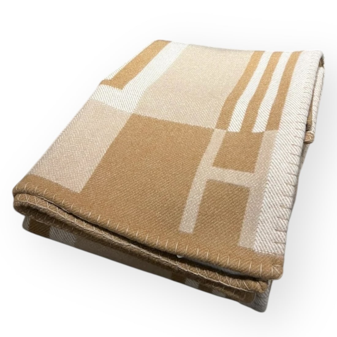 Hermes Light Brown & White Ithaque H Logo Wool Blanket: • Hermes • Ithaque • Wool Blanket • Light Brown • White Accents • Signature H Logo • Wool/Polyester Fiber Mix • 70" x 53.1" (in)