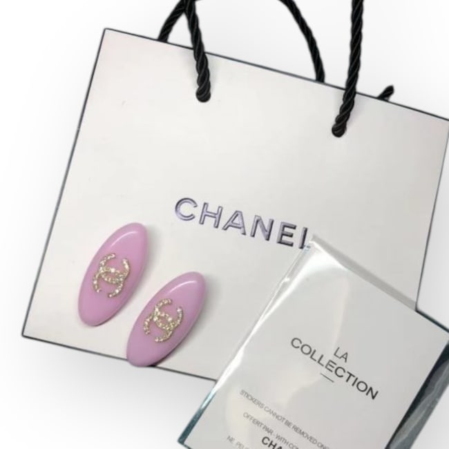 CHANEL 2PC Baby Pink/White Rhinestone CC Oval L.A Collection Hair Clips: • CHANEL • L.A. Collection • Gabrielle • 2Pc Set • Hair Clips • Baby Pink • White Rhinestone CC Logos • Gold Trim • Silver Tone Hardware • Shape: Long