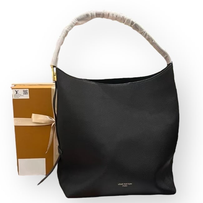 Louis Vuitton Black Hobo/Lock Handles Bucket Beaute Bag, Pouch, Lock, & Original Box: • Louis Vuitton • Black • Hobo Bucket Bag • Adjustable Strap Included • Magnetic Snap Closure • Removable Monogram Pouch Included • Side Lock • Gold Tone Hardwa