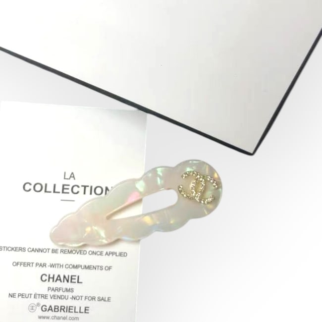 CHANEL White Opal/White Rhinestone CC L.A Collection Hair Clip: • CHANEL • L.A. Collection • Gabrielle • White Opal • Hair Clip • White Rhinestone CC Logo • Gold Tone Hardware • Unopened/In Original Packaging • CHANEL G