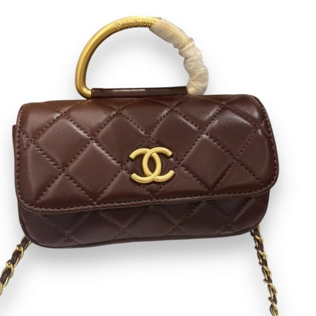 CHANEL Quilted Mini Flap Top Handle Beaute Bag & Original Box: • CHANEL • Burgundy • Mini Flap Top Handle Bag • Gold Tone Hardware • Dust Bag Included • Front CC Logo • Quilted Pattern • Gold Top Handle • Interior Slip