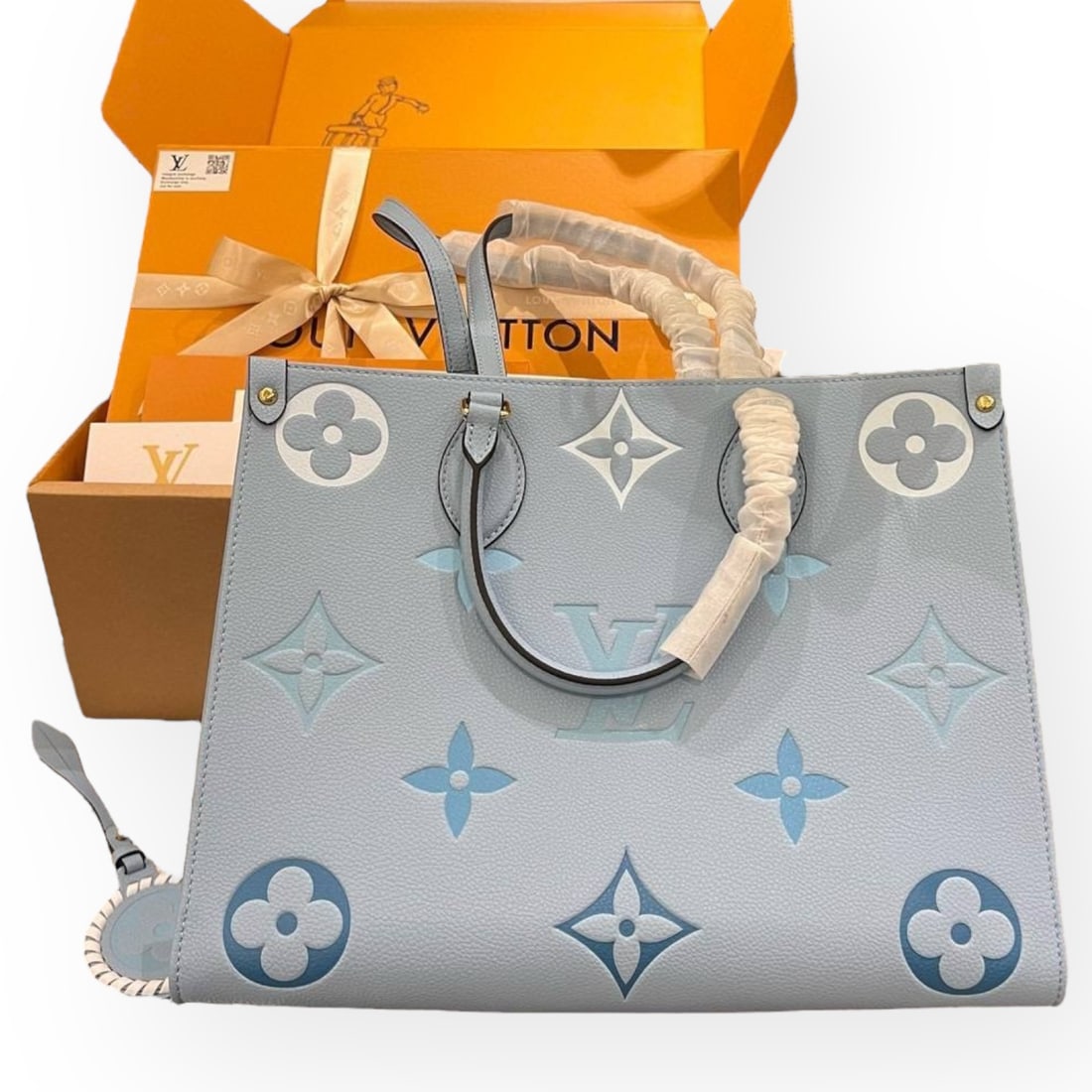 Louis Vuitton Blue/Gradient OnTheGo MM Beaute Bag & Original Box: • Louis Vuitton • OnTheGo MM • Tote • Blue • Gradient Accents • Double Handles • Removable Strap Included • Gold Tone Hardware • Interior Zip Pocket •