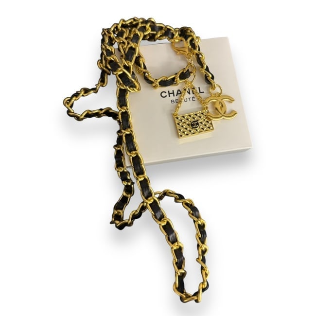 CHANEL Belt Adjustable CC Logo & Bag Beaute Belt & Original Box: • CHANEL • Belt • Black & Gold CC Logo • Handbag Charms • Gold Tone Hardware • Adjustable • 41.3" (in) • Original Packaging & CHANEL Gift Bag Included • VI